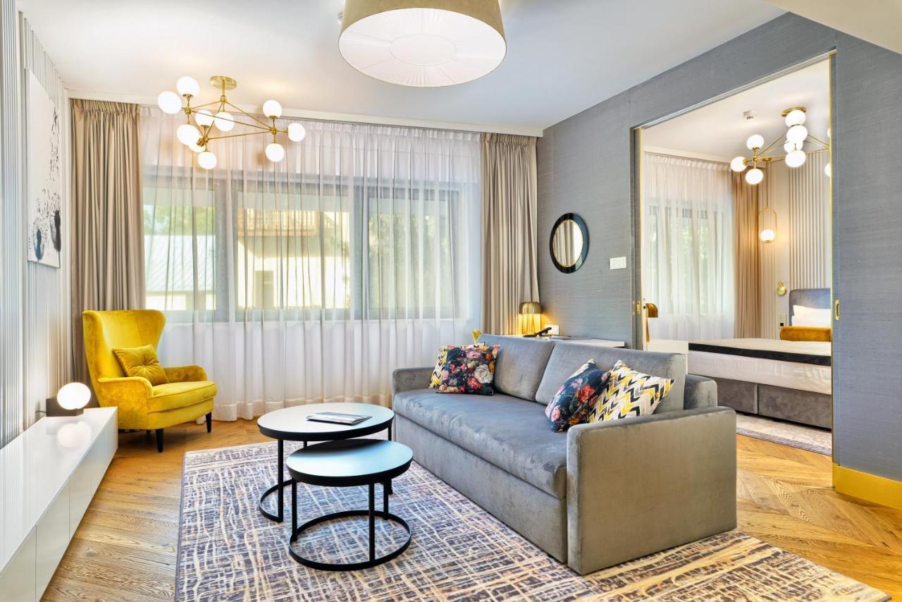 Hotel Ferreus Modern Art Deco Cracovia Esterno foto A living room in a modern apartment